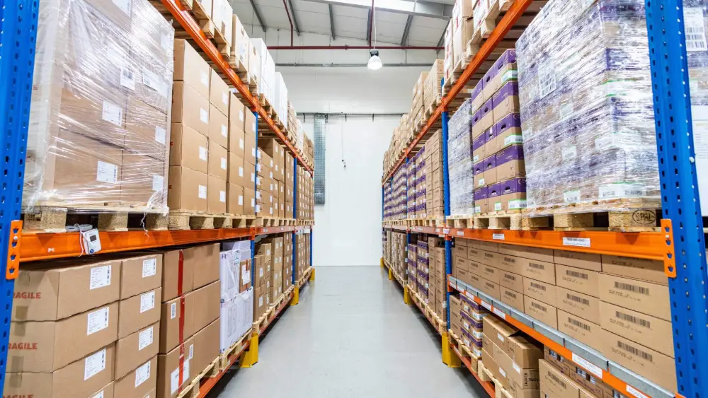 Temperature controlled warehouse racks stocked with healthcare products